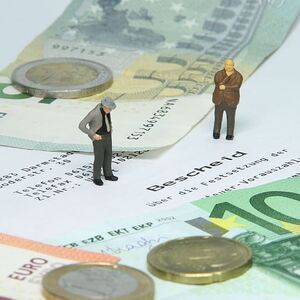 tax-office-tax-assessment-miniature-figures-money